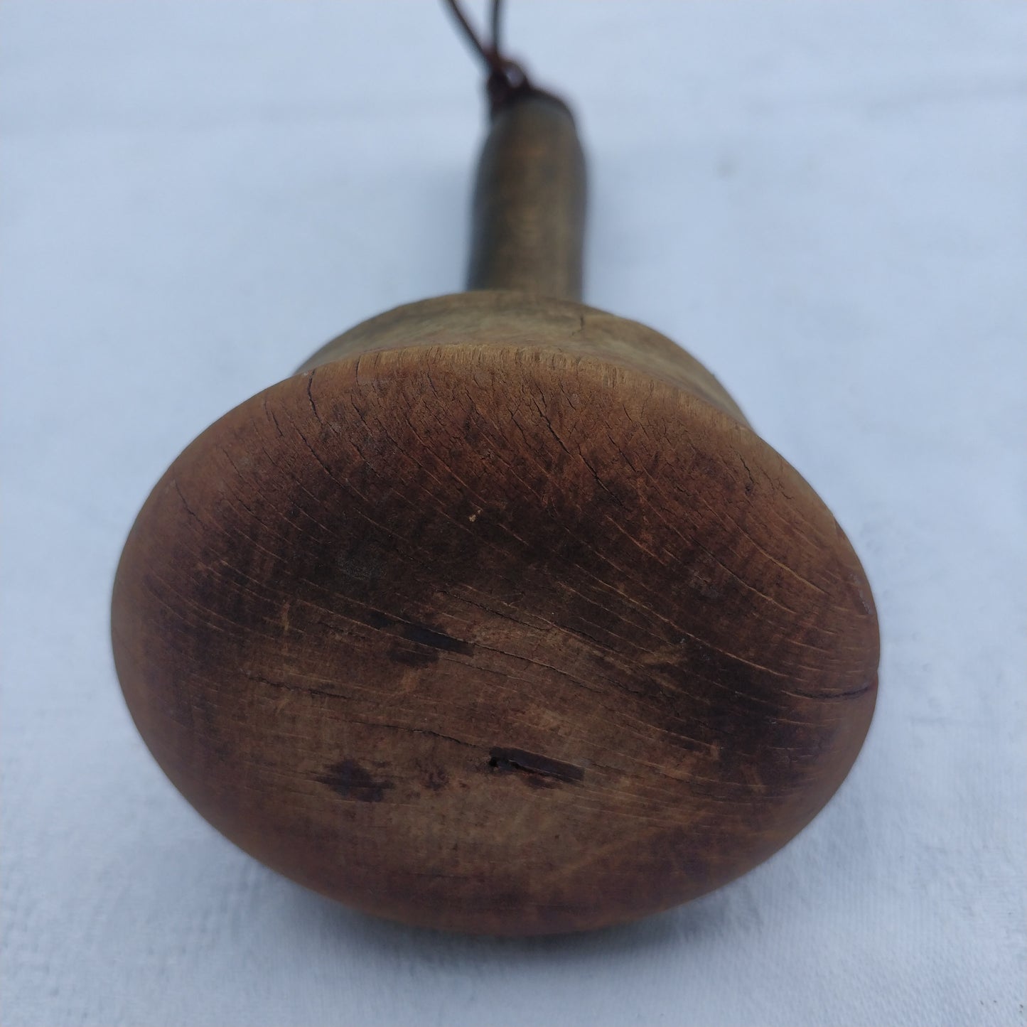 Ancien pilon en bois.