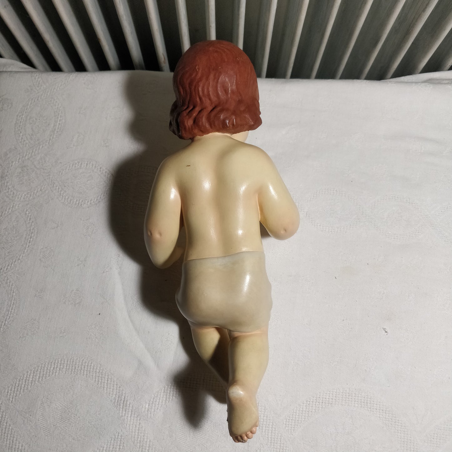 Enfant Jésus plus trois santons pour chrèche.