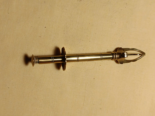 Ancienne pince à sucre trois griffes, vintage, en laiton.