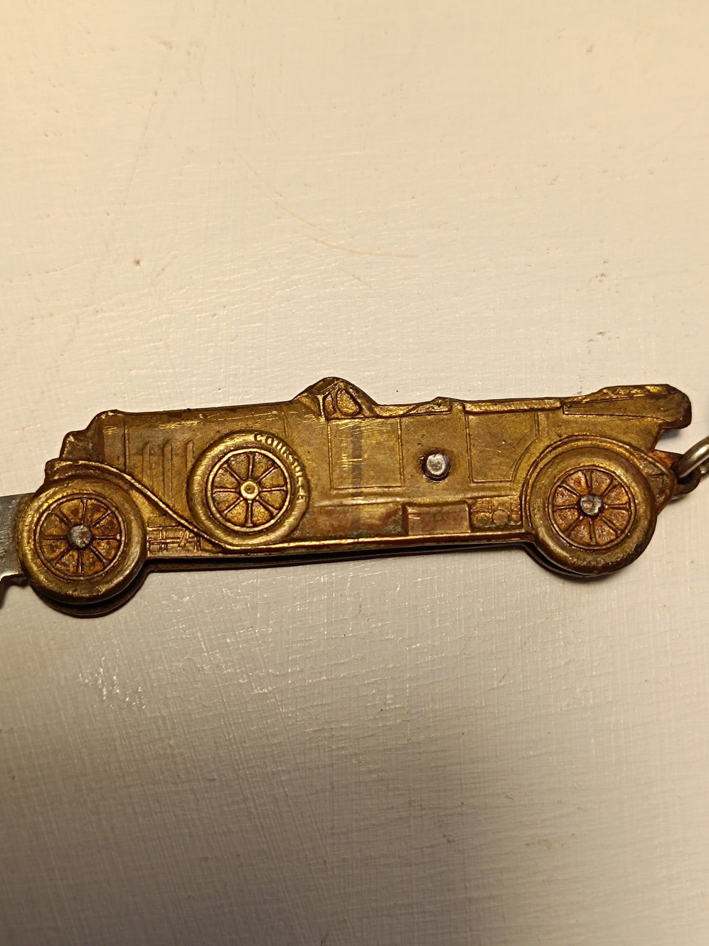 Ancien porte clés voiture ancienne et canif. Couperier-Coursolle.
