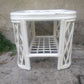 Table basse bois cintré et rotin.