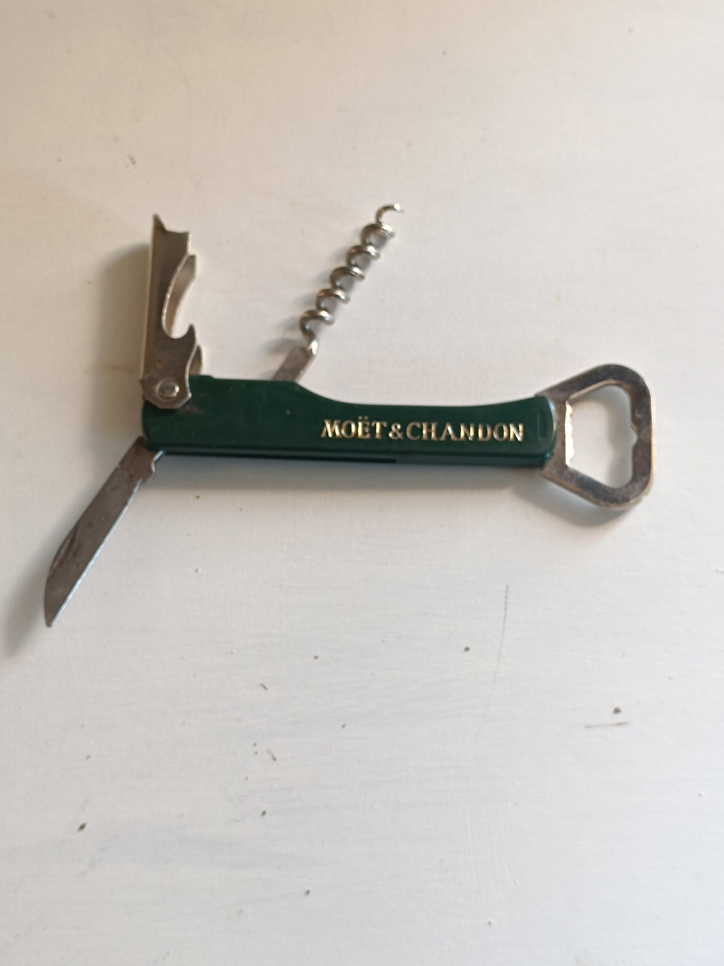 Moet et Chandon, tire bouchon décapsuleur en acier vintage.