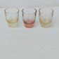 Six verres vintage de différentes couleurs pour liqueur ou digestif.