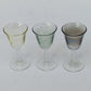 Lot de six verres à liqueur ou digestif de différentes couleurs.