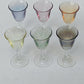 Lot de six verres à liqueur ou digestif de différentes couleurs.