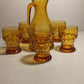 Pichet à jus en verre ambré plus cinq verres ambrés année 70.