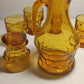 Pichet à jus en verre ambré plus cinq verres ambrés année 70.